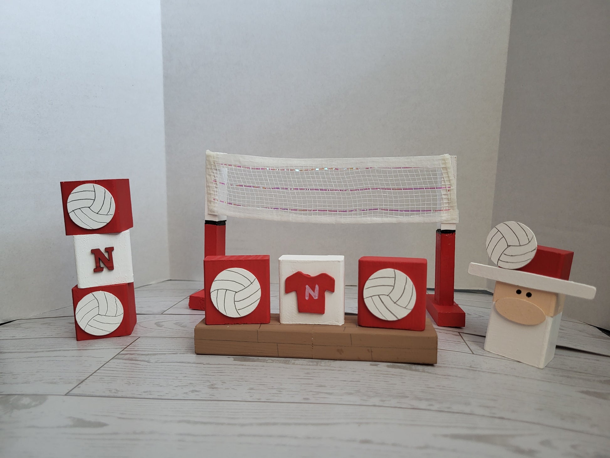 Handmade Wooden volleyball shelf sitters with festive designs-perfect for mantels, tiered trays, and farmhouse décor 