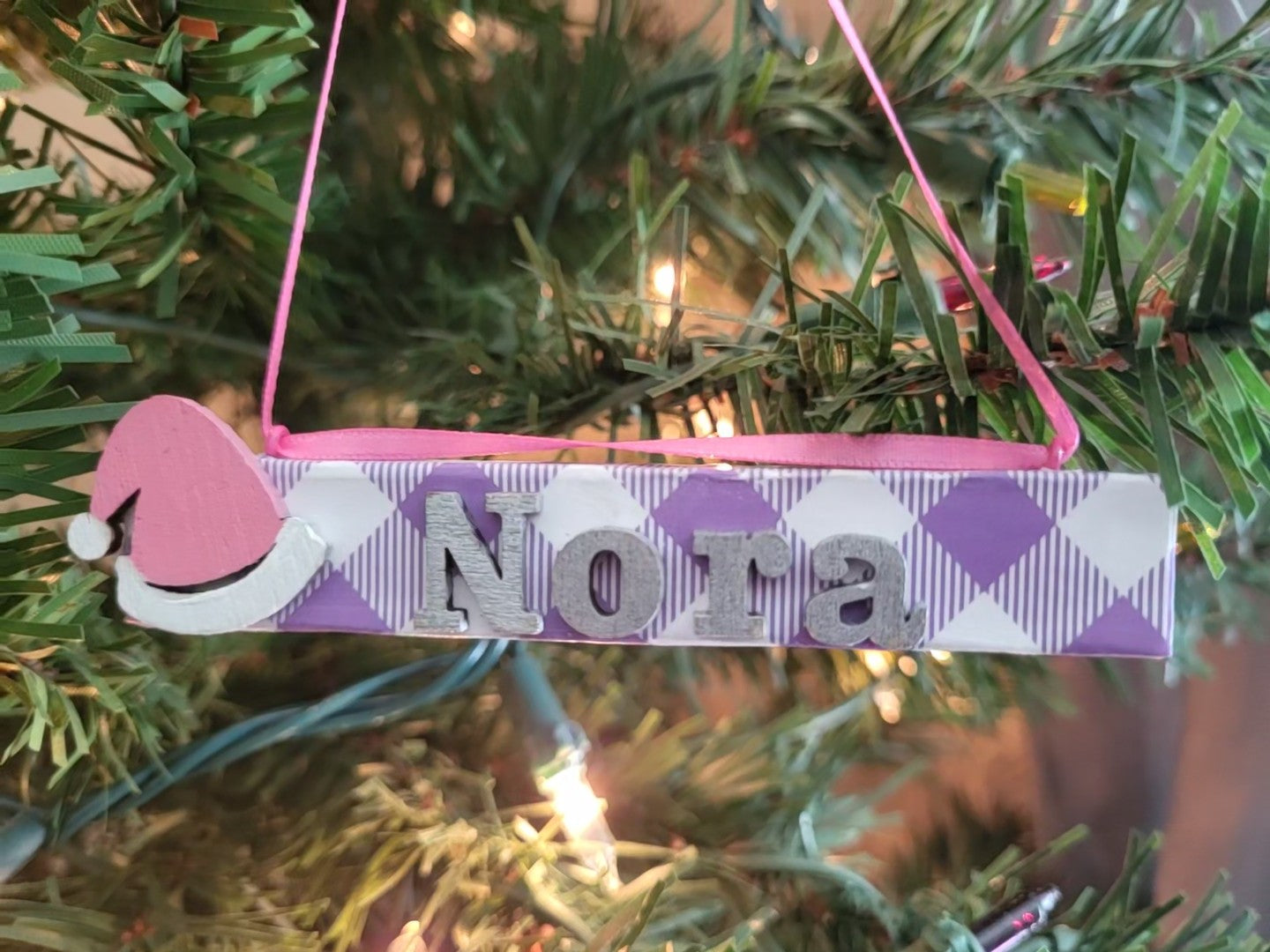 Hand-painted wooden name ornament personalized with name and custom color and accent —perfect for Christmas tree décor, gifts, and holiday keepsakes.