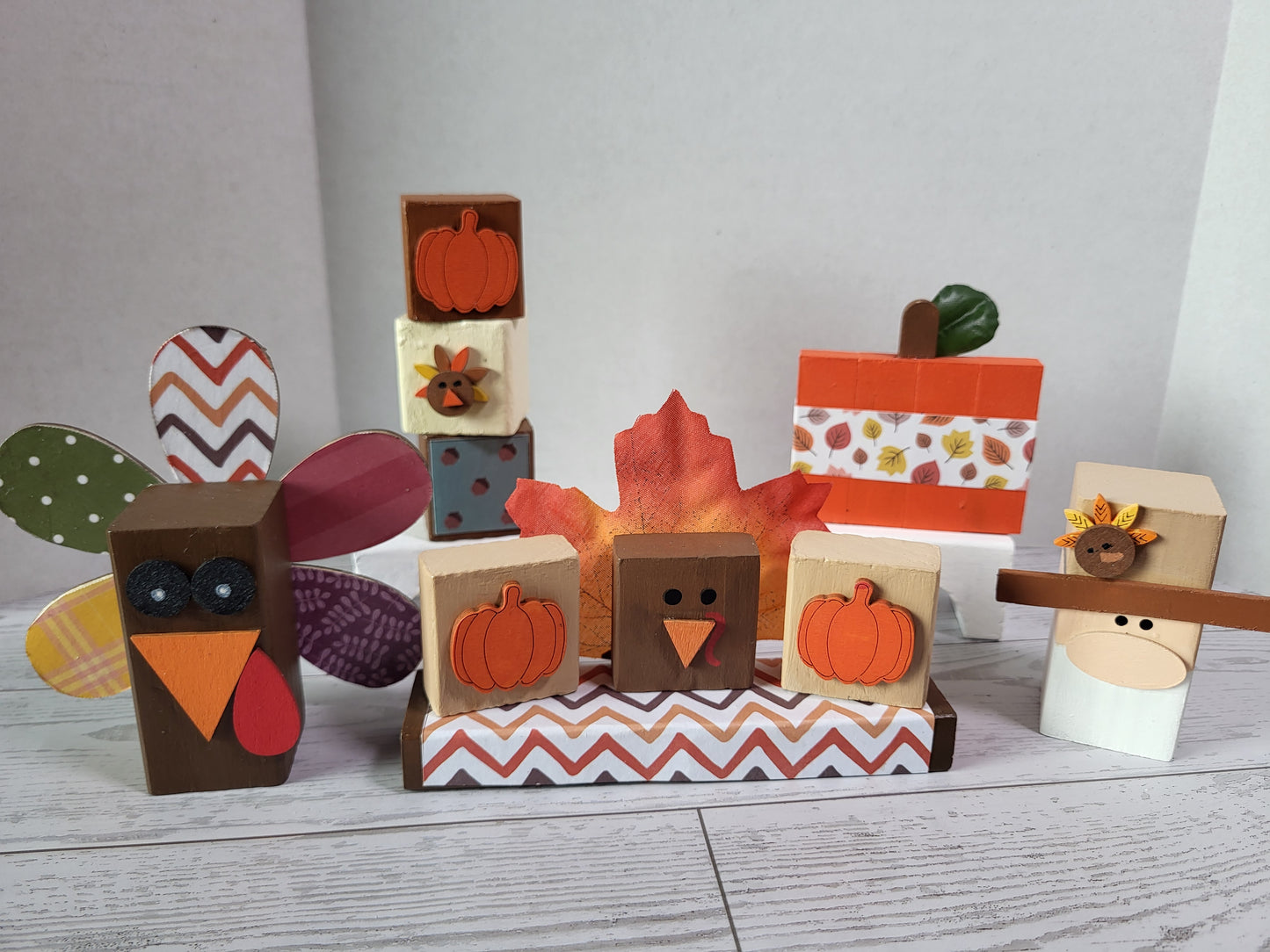 Hand-painted wooden Thanksgiving shelf sitters with festive holiday designs—perfect for mantels, tiered trays, and farmhouse holiday décor.