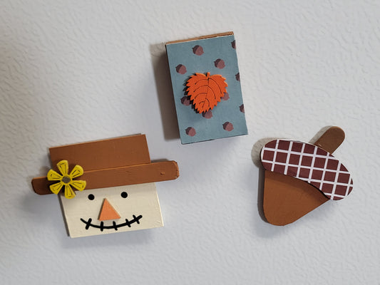 Handmade wooden magnets with holiday designs - perfect for fridges, office boards, or any magnetic space.