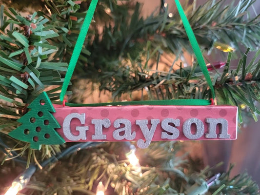 Hand-painted wooden name ornament personalized with name and custom color and accent —perfect for Christmas tree décor, gifts, and holiday keepsakes.